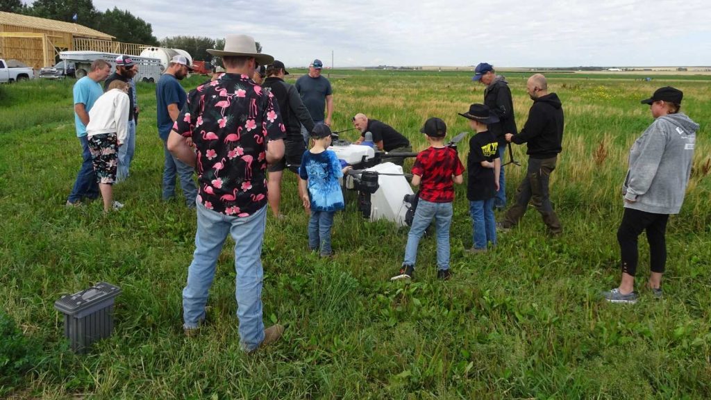 Ag Drones team explaining EAVISION spray-drone technology in Vulcan
