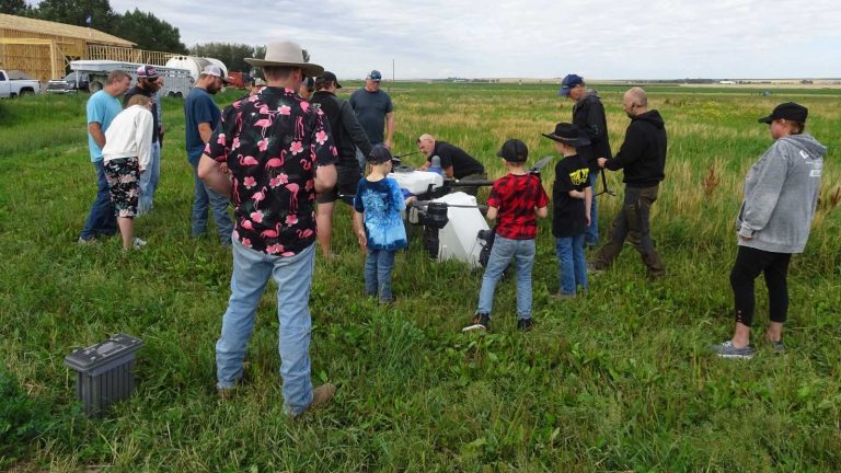 Ag Drones team explaining EAVISION spray-drone technology in Vulcan