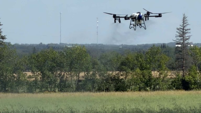 EAVISION J150 ag spray drone flying at the Westlock, Alberta demonstration